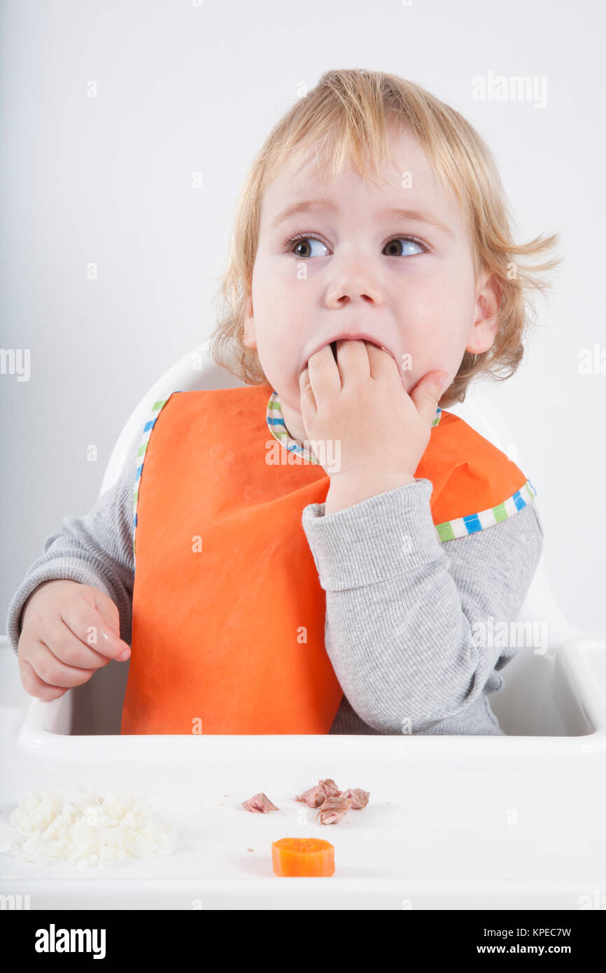 baby eating hand Stock Photo Alamy