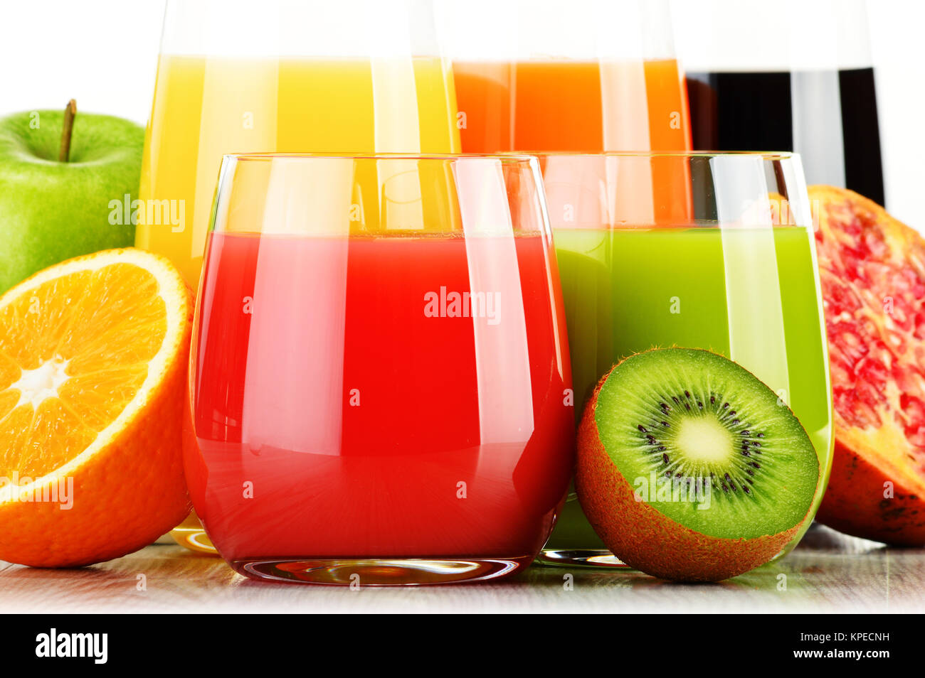 Glasses of assorted fruit juice. Detox diet Stock Photo Alamy