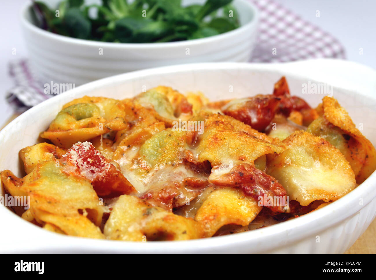 baked tortellini in tomato cream sauce Stock Photo Alamy
