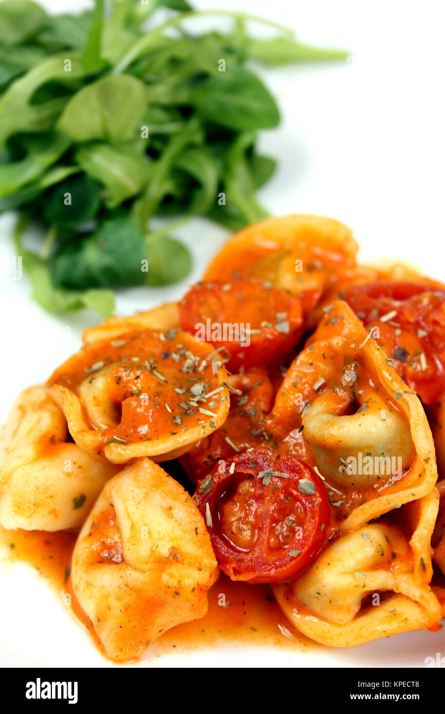 tortellini in tomato cream sauce Stock Photo Alamy