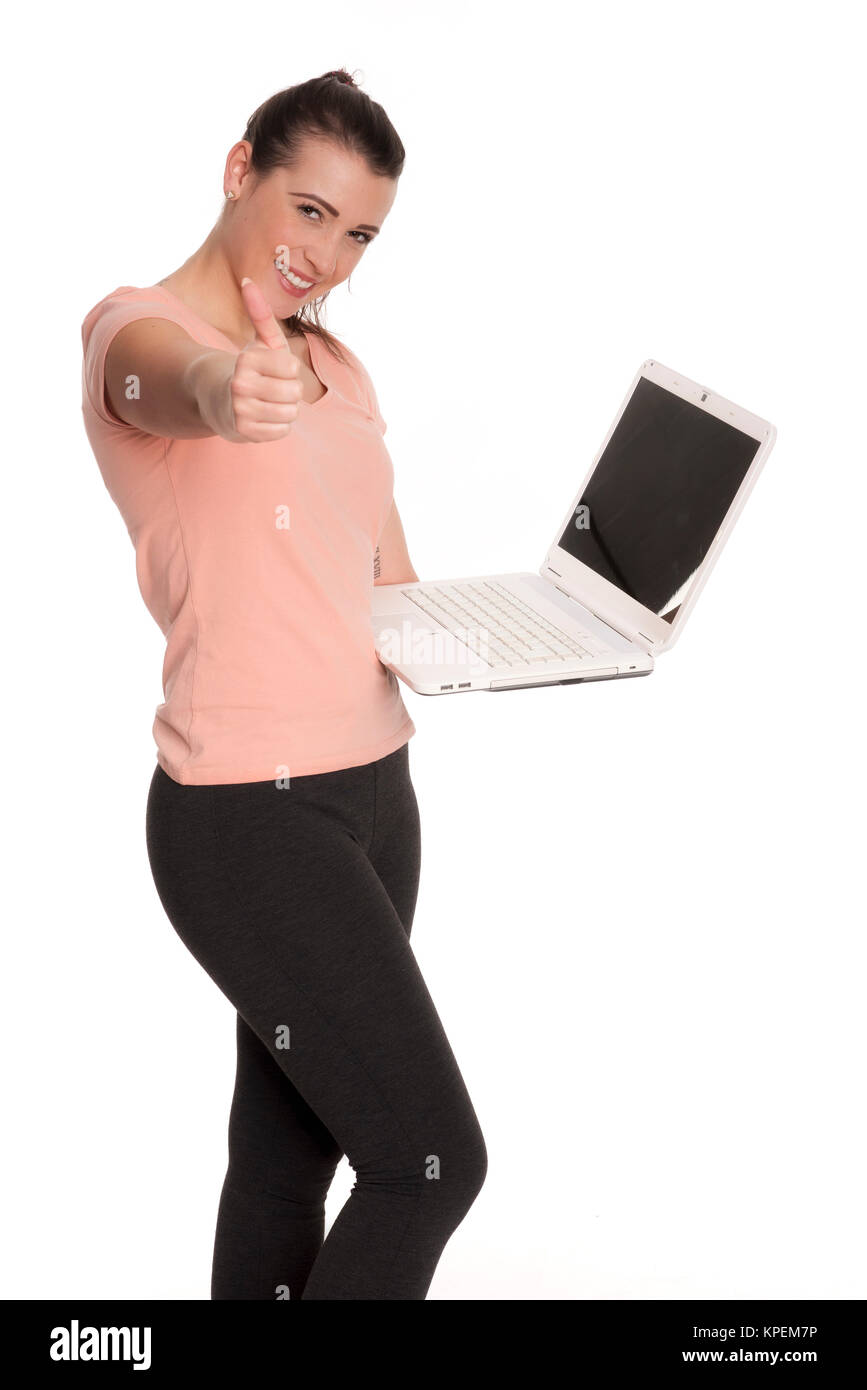 young woman on laptop showing thumbs up Stock Photo - Alamy