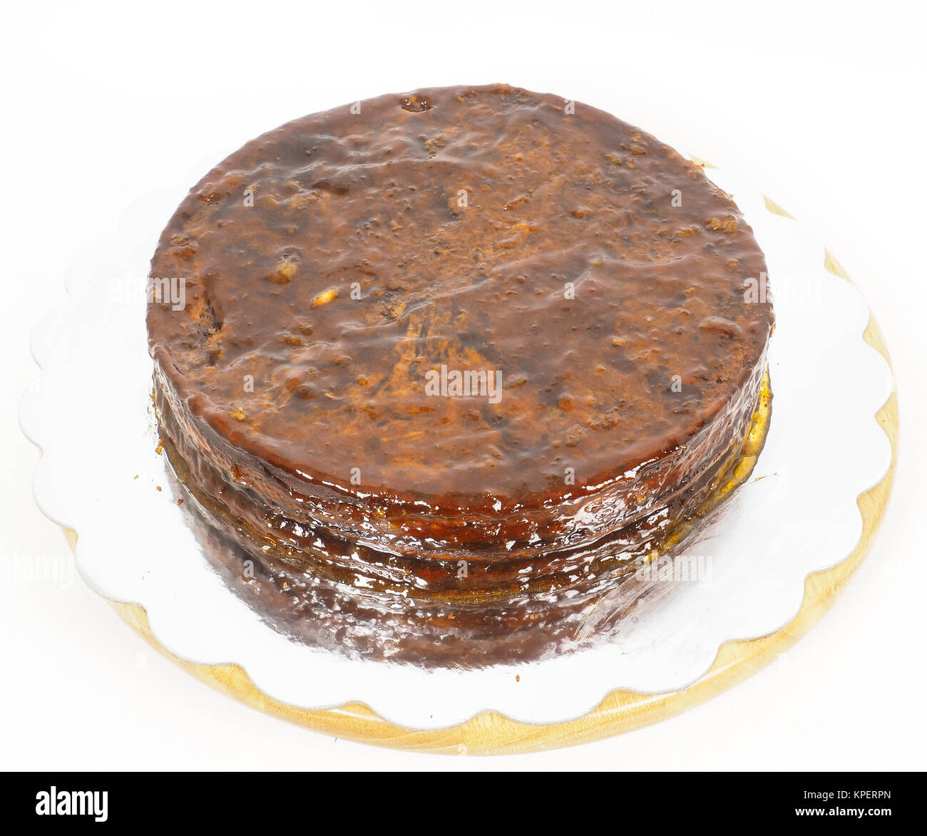 Apricot glazed Sacher torte chocolate cake on silver mirror plate Stock Photo