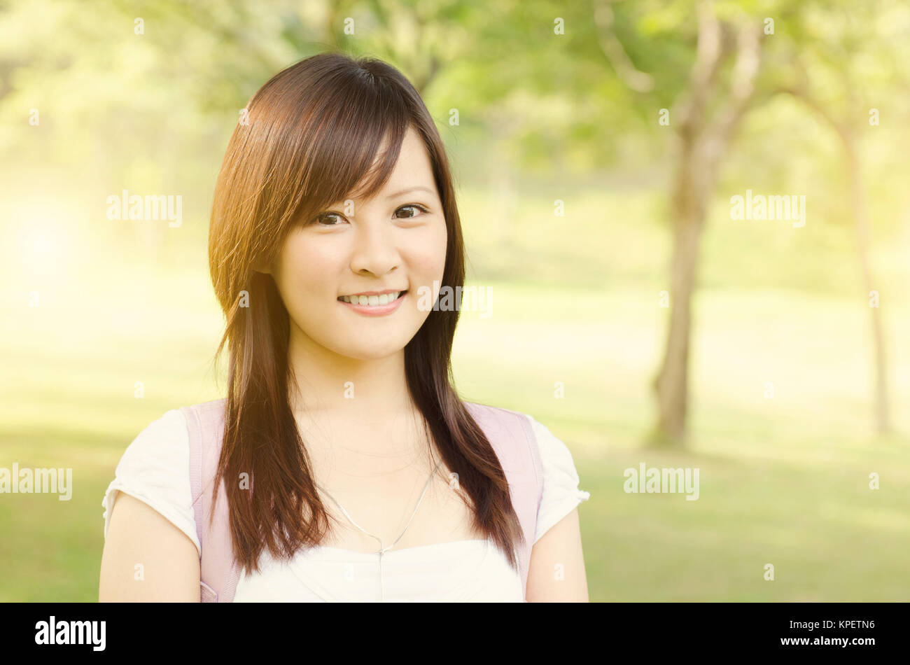 Young college girl student smiling Stock Photo - Alamy