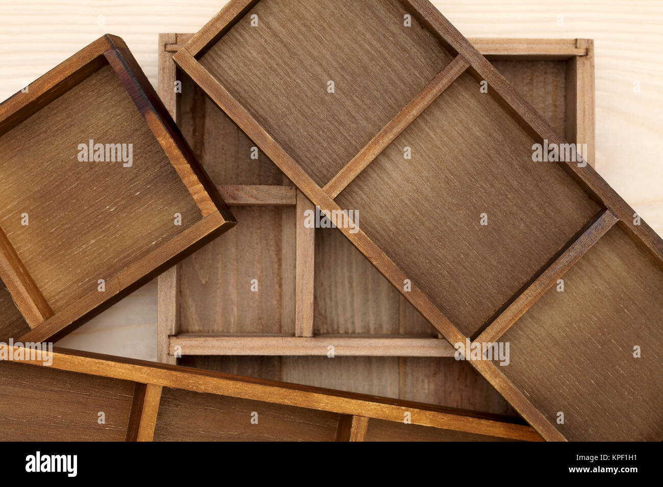 Stack of empty wooden box on wood background Stock Photo