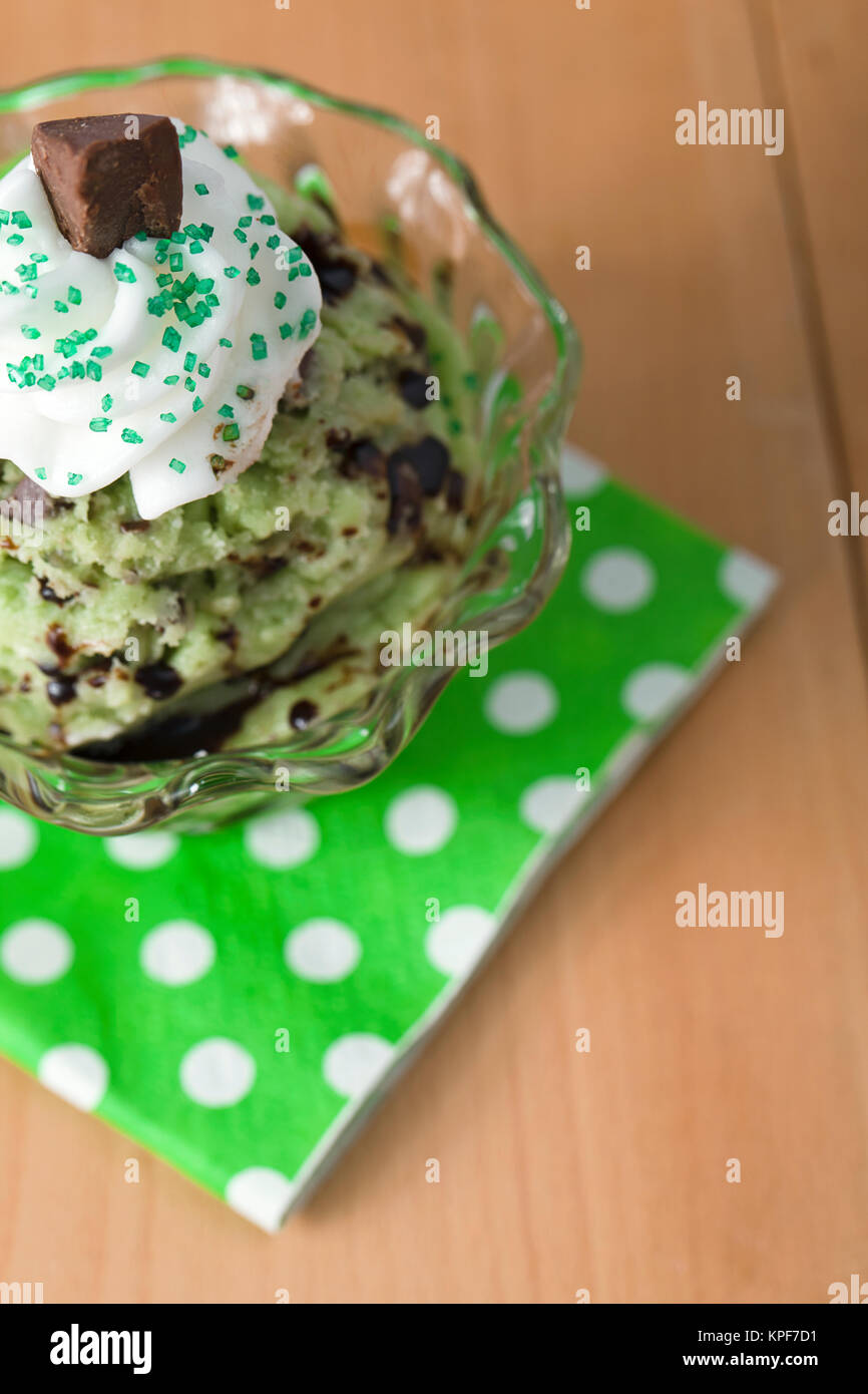 mint ice cream with chocolate bar toppings Stock Photo Alamy