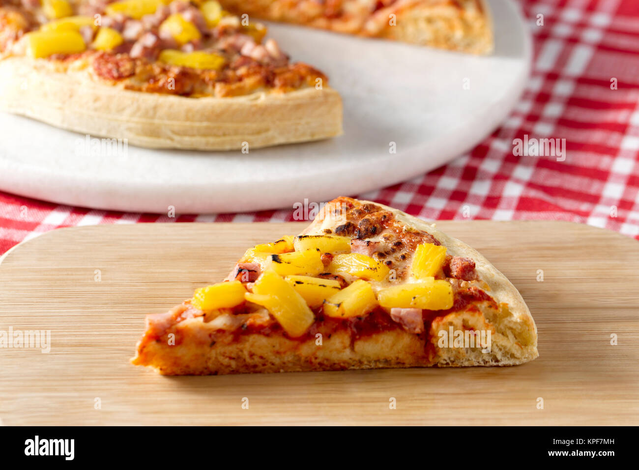 slice of hawaiian pizza Stock Photo Alamy