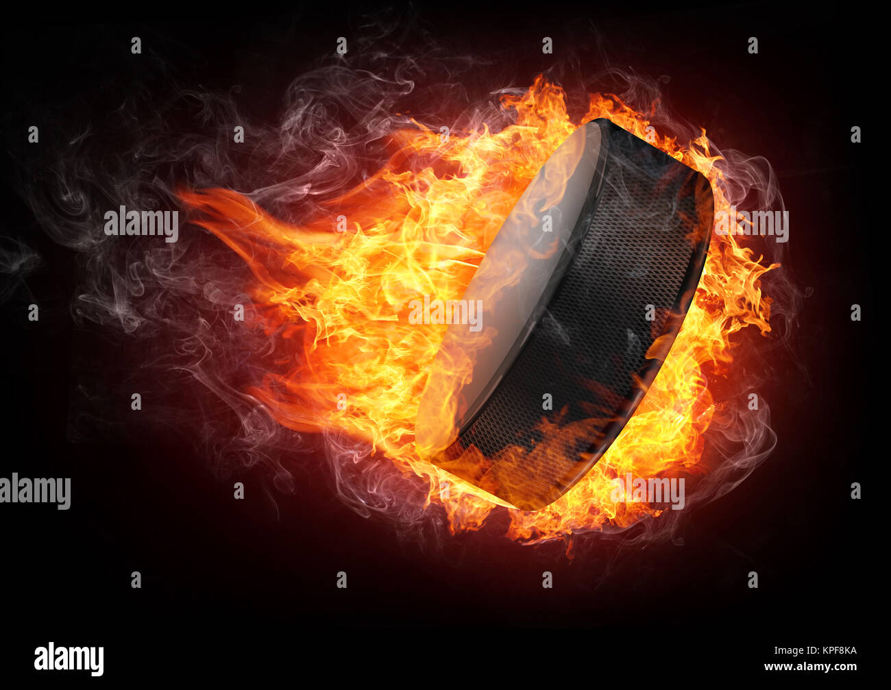 Hockey Puck in fire Isolated on Black Background Stock Photo - Alamy