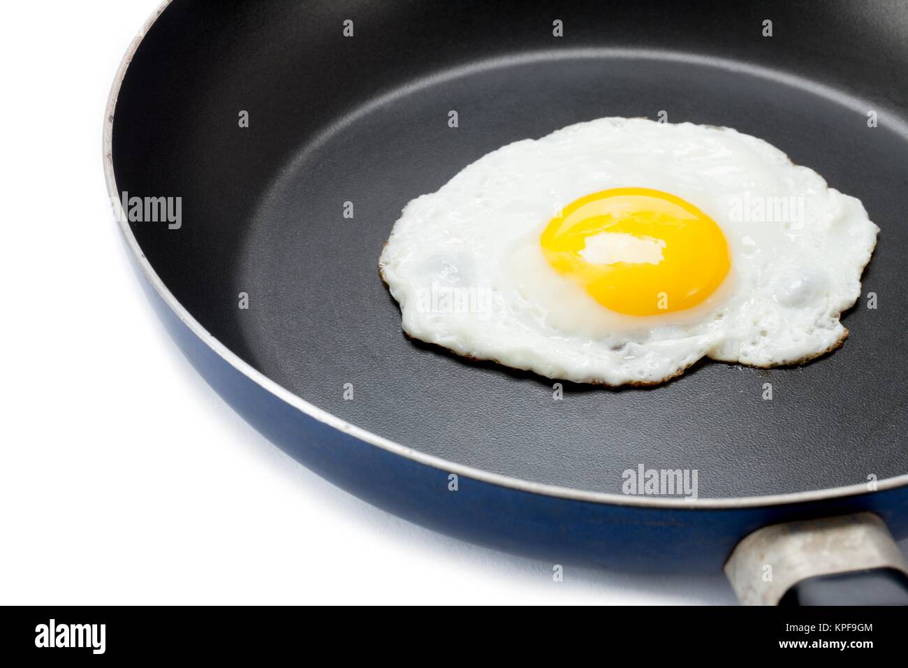 fried egg in a pan Stock Photo