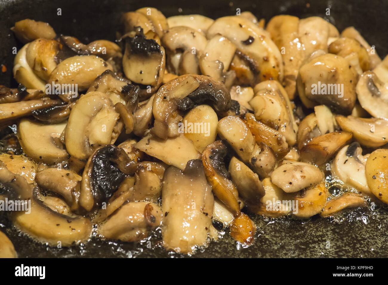 fried mushroom in frying pan Stock Photo Alamy