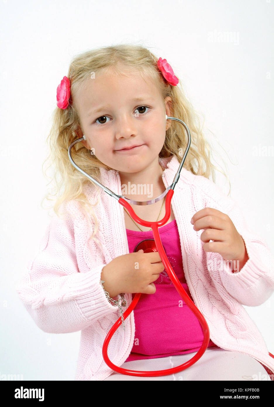 Kleines Maedchen mit Stethoskop - girl with stethoscope Stock Photo