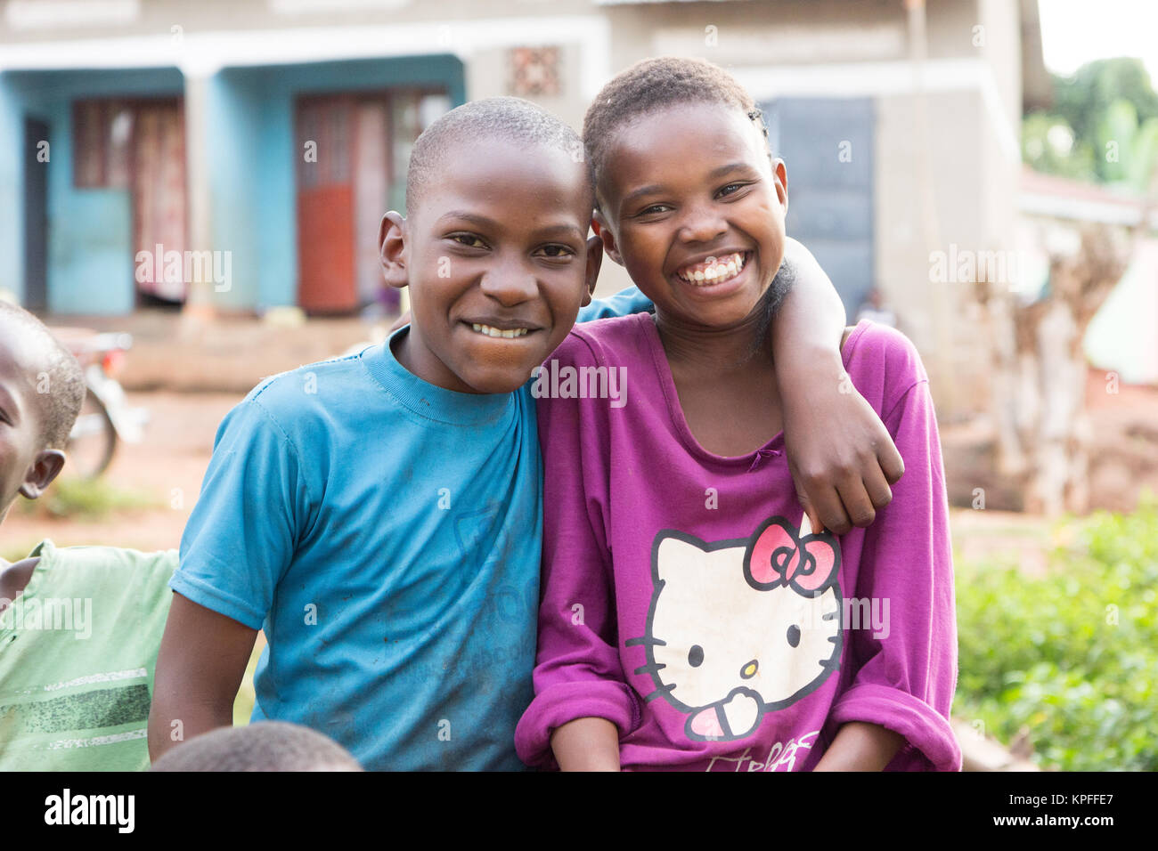 Lugazi, Uganda. June 18 2017. Two laughing Ugandan children - a boy and a girl - perhaps a brother and a sister. Stock Photo