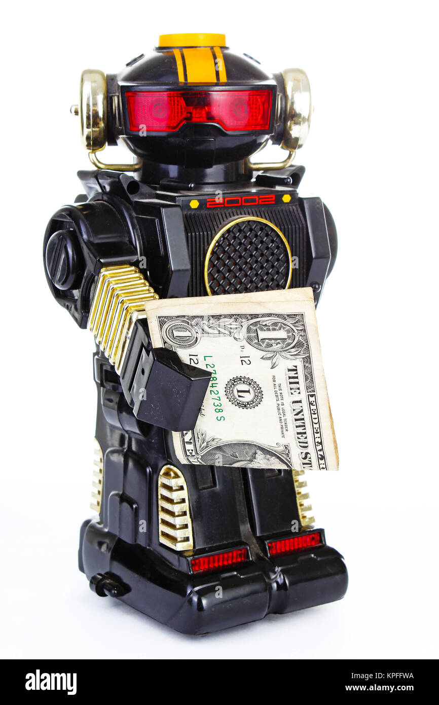 Robot on white background. Classic robot retro toy. . Classical black  plastic alloy robot with money. Electronic robotic robot holding money.  White ba Stock Photo - Alamy