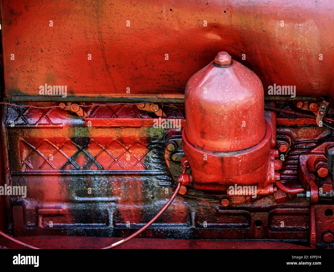 Old red Tractor engine Stock Photo - Alamy
