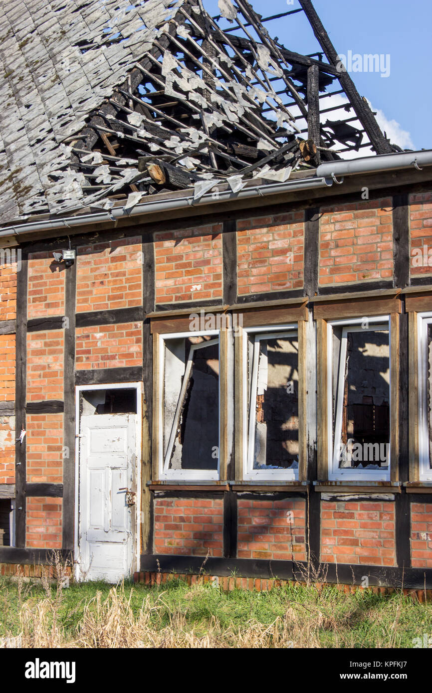 a destroyed by fire tudor style house Stock Photo