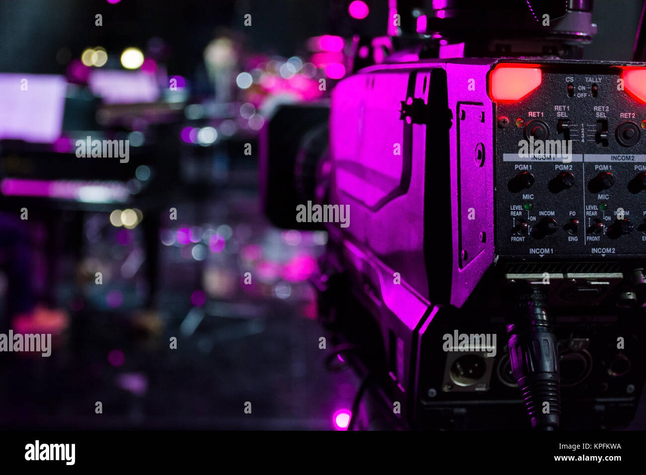 professional digital video camera in a concert hall and blur piano
