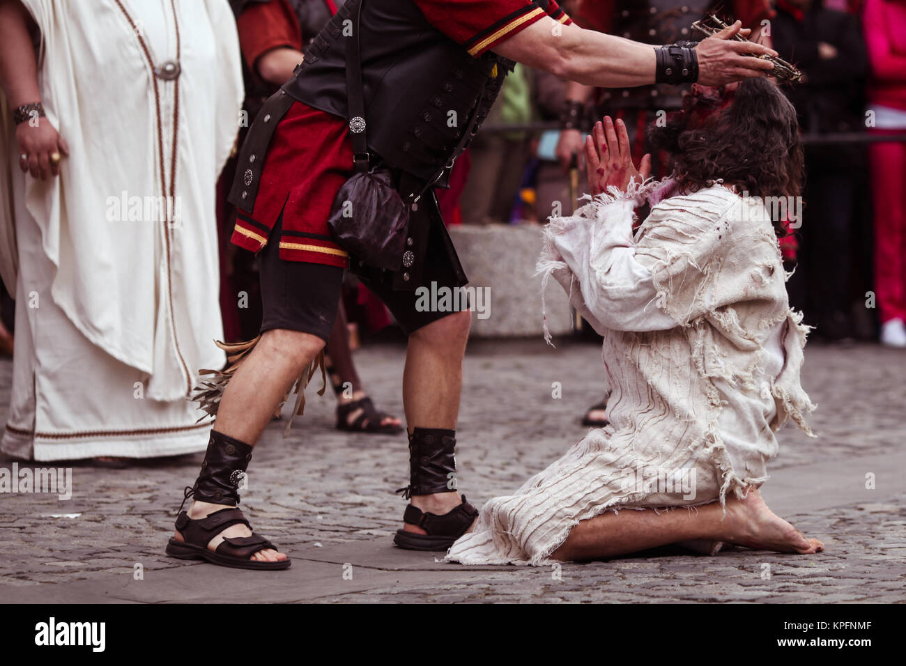 Dramatisation by actors of the torture and crucifixion of Jesus Christ by the Romans Stock Photo