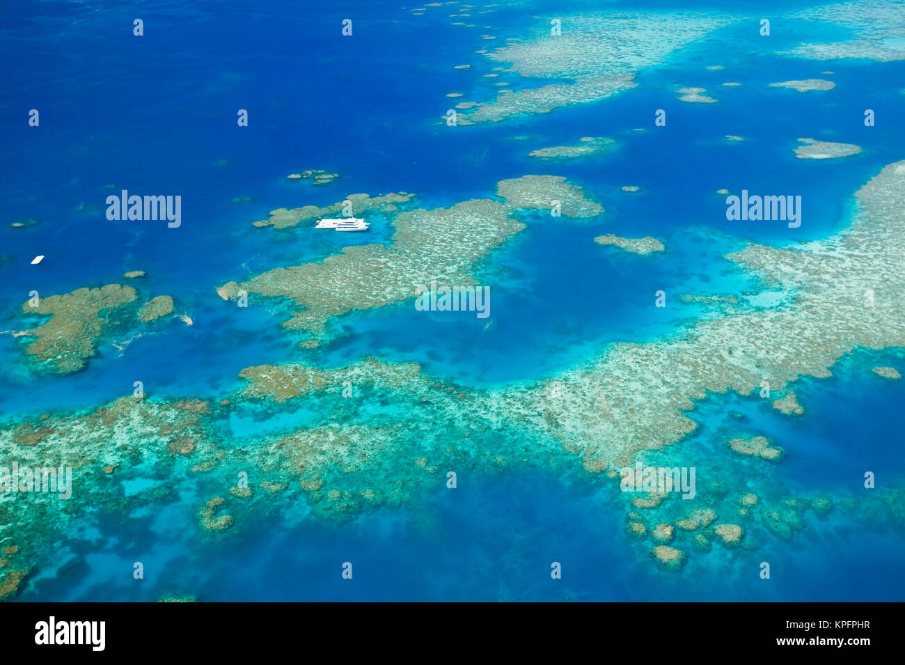 Australia, Queensland, North Coast, Cairns Area. The Great Barrier Reef- Aerial View of Moore Reef. Stock Photo