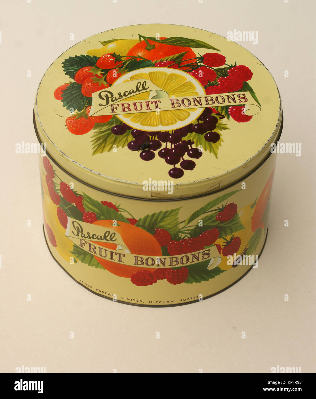 Pascall Fruit Bon Bons. Vintage retro sweet tins, confectionary, 1950s. These tins were displayed in confectionary shops, and contents were sold to customers. The tin was returned to the maker for a deposit. Many have found other uses for storage in later years. Stock Photo