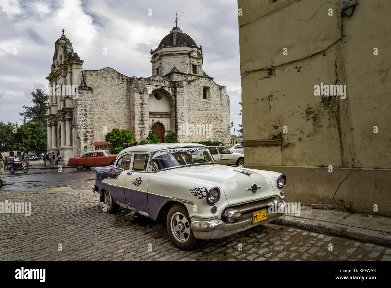 1950's era antique car and street scene from Old Havana, Havana, Cuba Stock Photo
