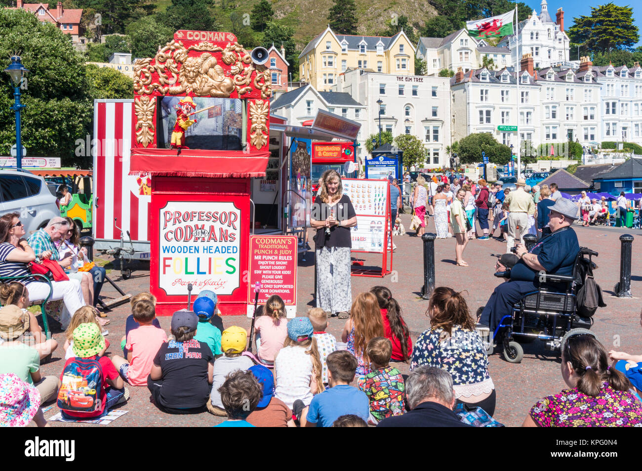 llandudno wales punch and judy kids watching a traditional punch and