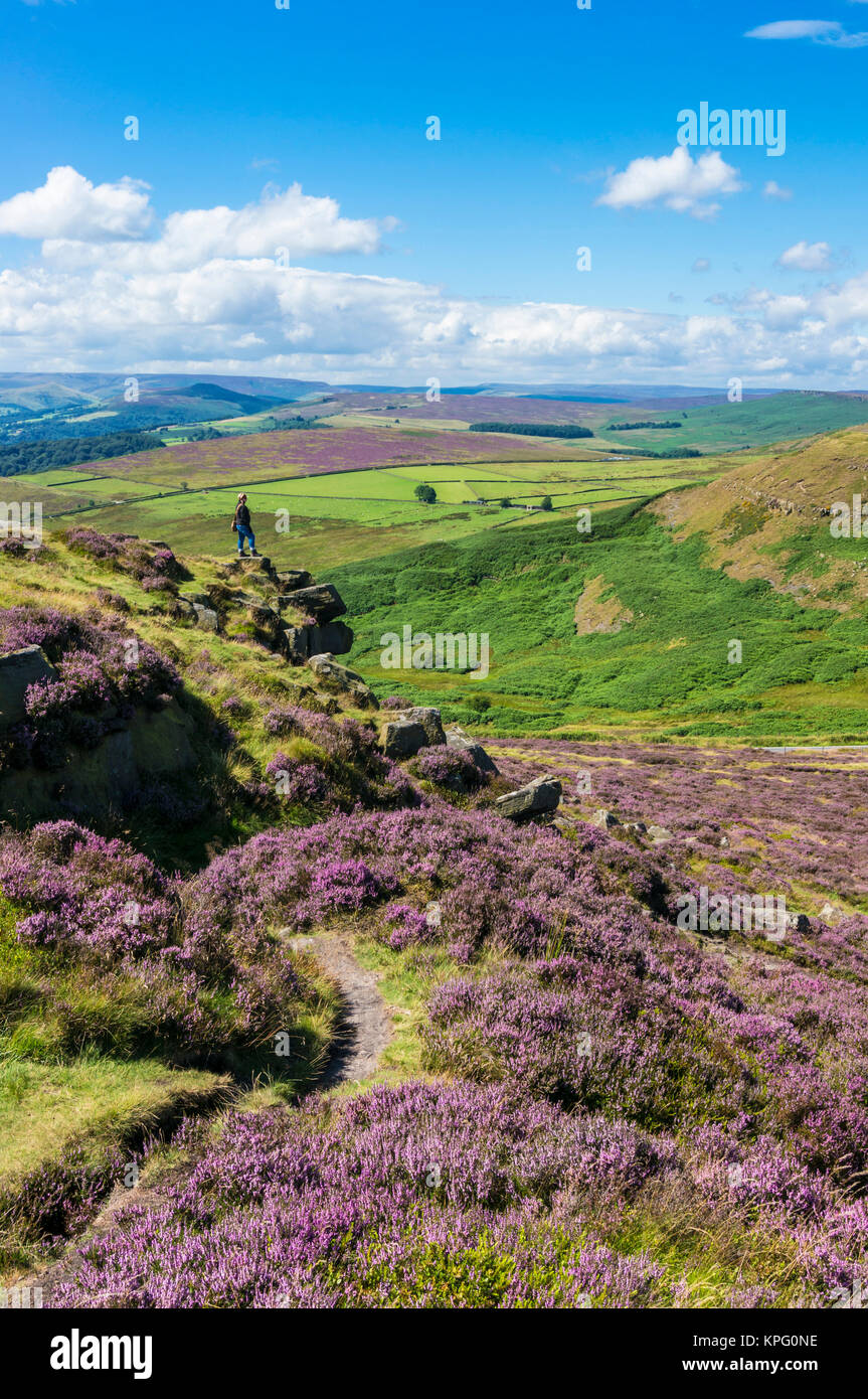 peak district derbyshire peak district national park one woman admiring the view across the valley derbyshire england gb uk eu europe Stock Photo