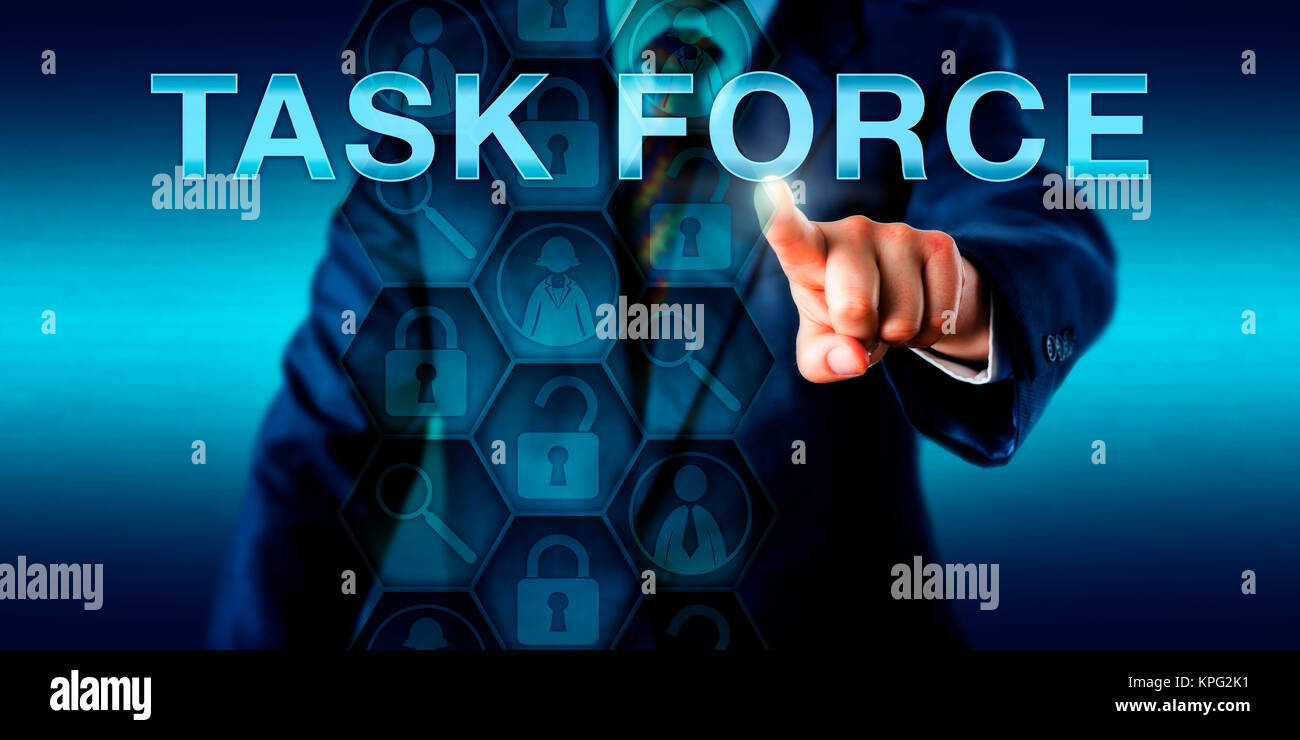 Forensic Expert Pressing TASK FORCE. Stock Photo