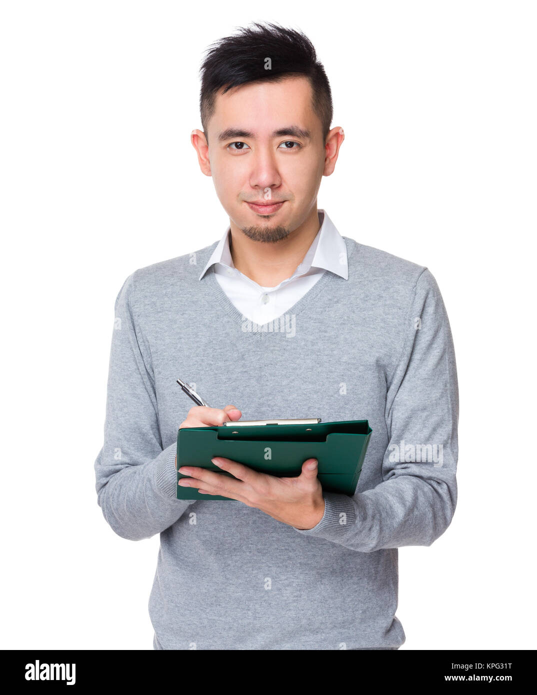 Young businessman take note on clipboard Stock Photo - Alamy