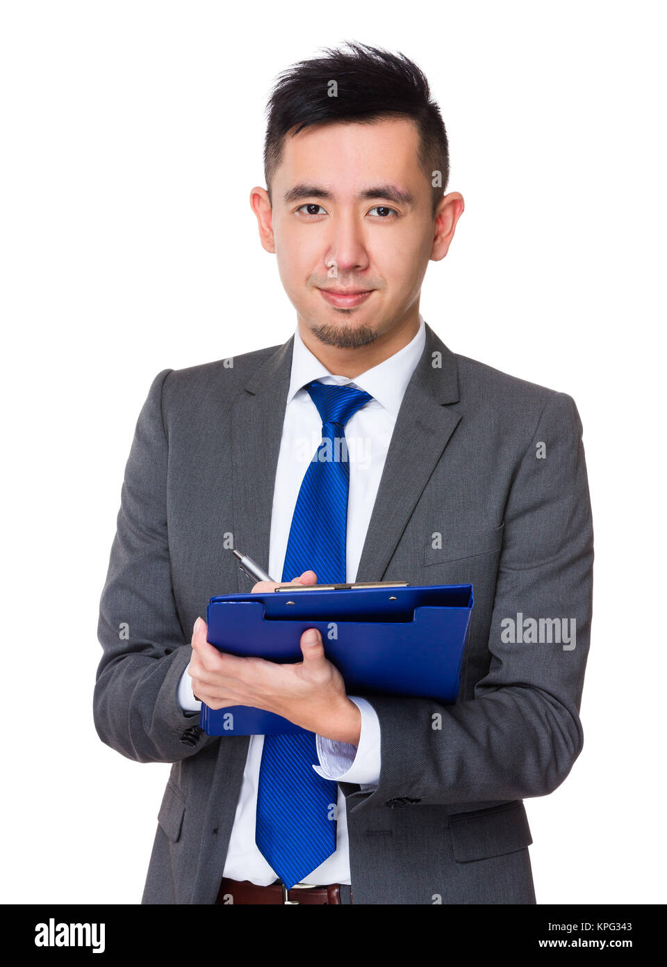 Asian Young Businessman take note on clipboard Stock Photo - Alamy