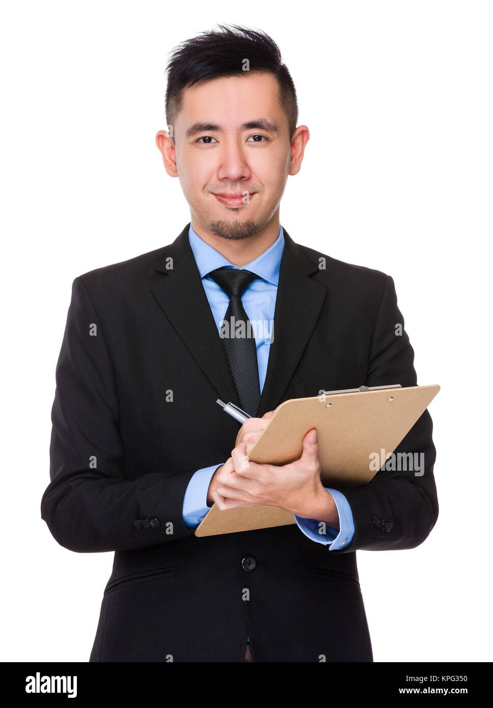 Young Businessman take note on clipboard Stock Photo - Alamy