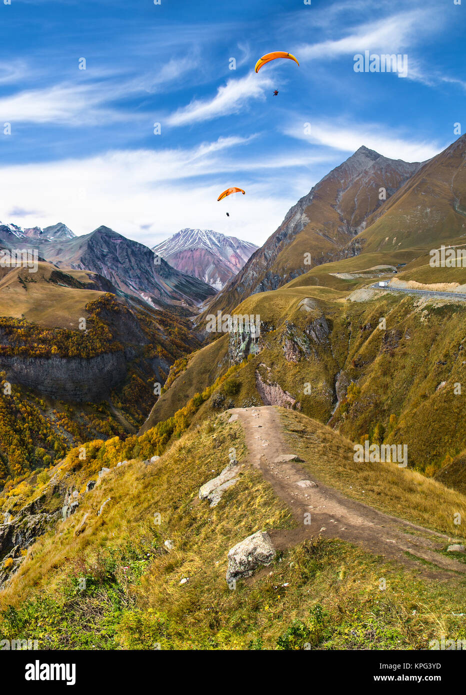 Paragliding over mountains of Gudauri.  Georgia. Europe. Stock Photo
