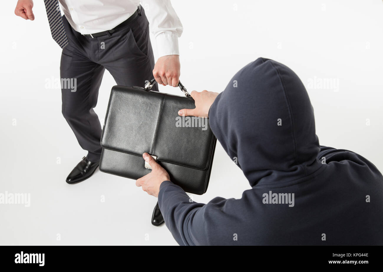 Unknown man take away a businessman's briefcase Stock Photo