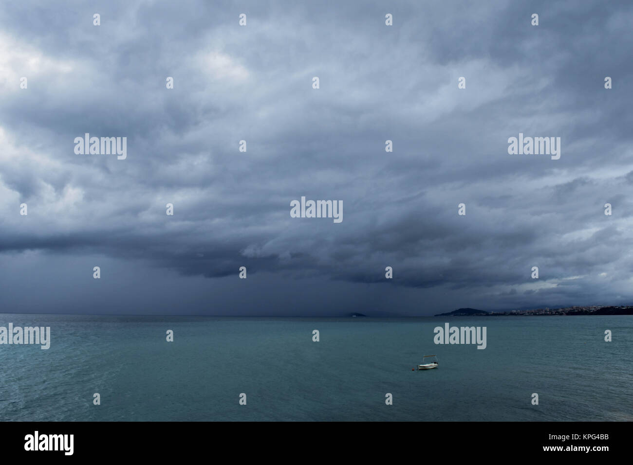 Dark sky at stormy weather with huge heavy clouds over the sea Stock ...