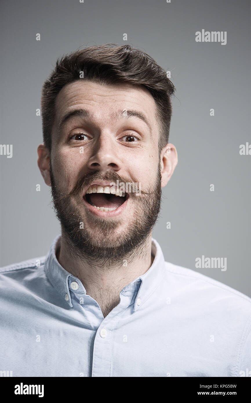 The young man looking at camera Stock Photo - Alamy