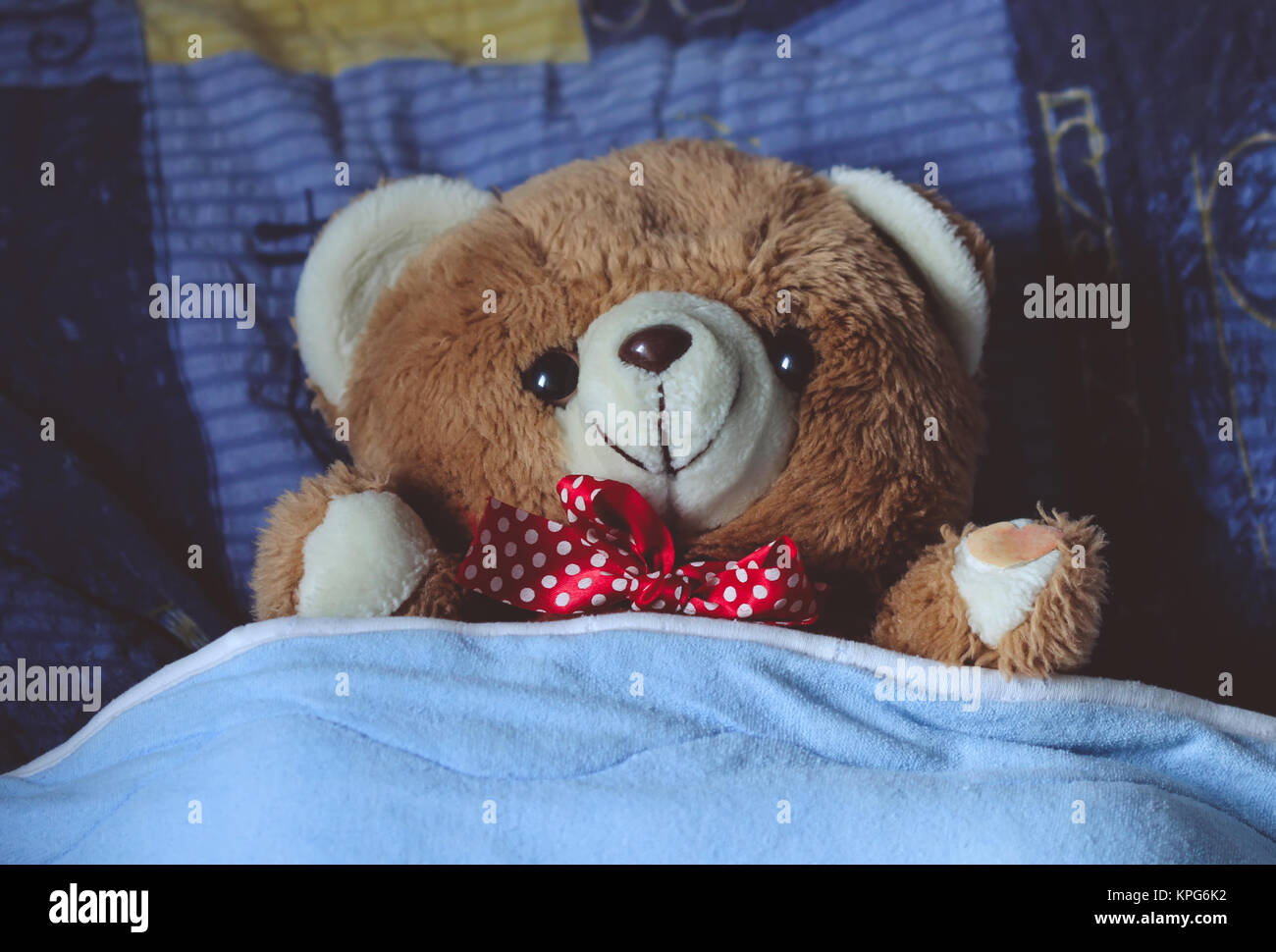 Teddy bear in bed Stock Photo Alamy