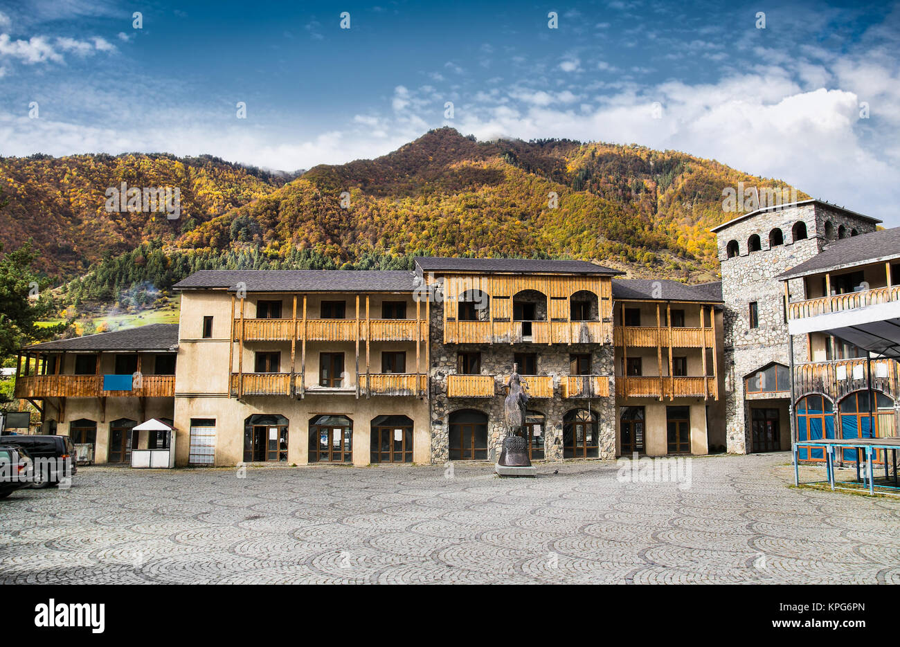 Wood and stone buildings in the very center of Mestia , Square (Piazza), Georgia. Europe. Stock Photo