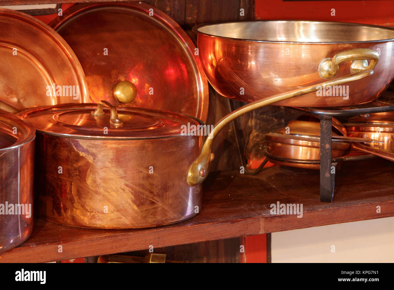 Copper pots in the kitchen Stock Photo Alamy