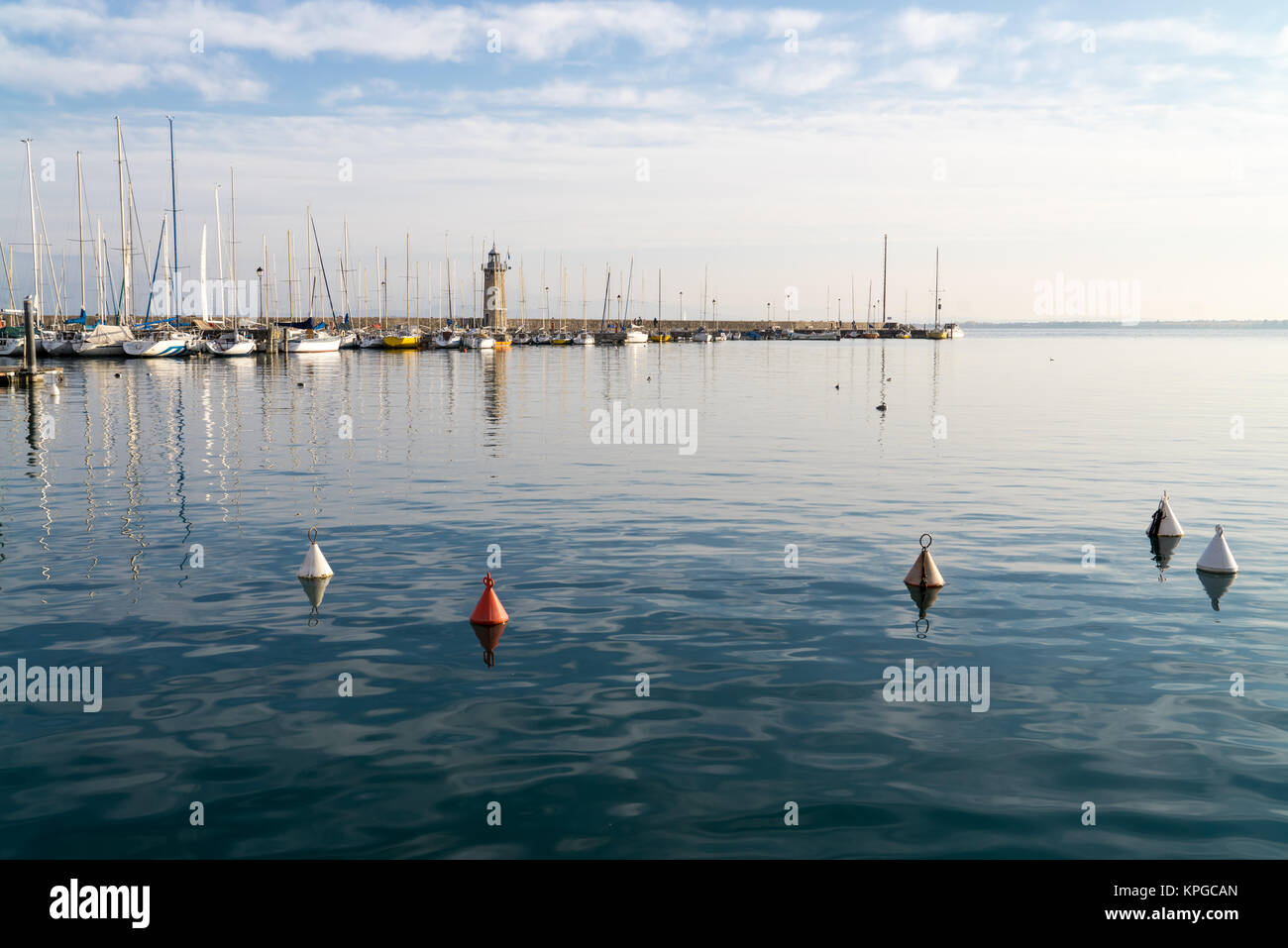 Desenzano lighthouse and marina, Garda lake, Italy Stock Photo