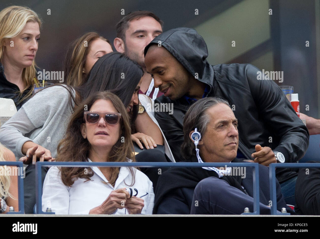 FLUSHING NY- SEPTEMBER 08: Andrea Rajacic, Thierry Henry, at the Mens Singles Finals Day fifteen of the 2014 US Open at the USTA Billie Jean King National Tennis Center on September 8, 2014 in the Flushing neighborhood of the Queens borough of New York City   People:  Andrea Rajacic, Thierry Henry Stock Photo