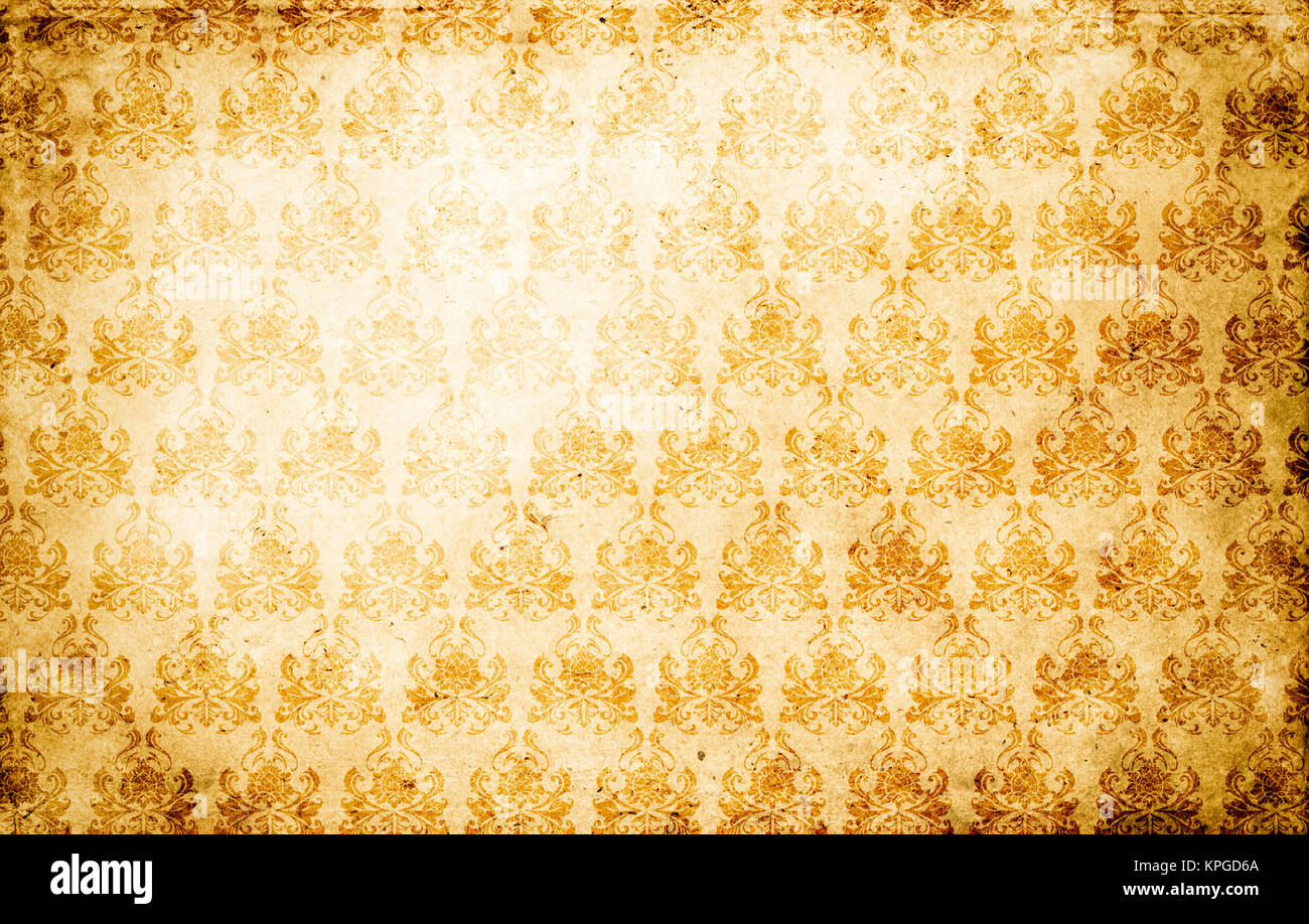 Old dirty paper background with oldfashioned floral patterns. Vintage