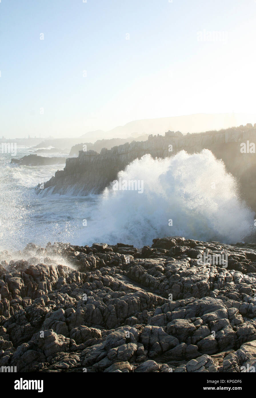 Foamy waves breaking over rocks hi-res stock photography and images - Alamy