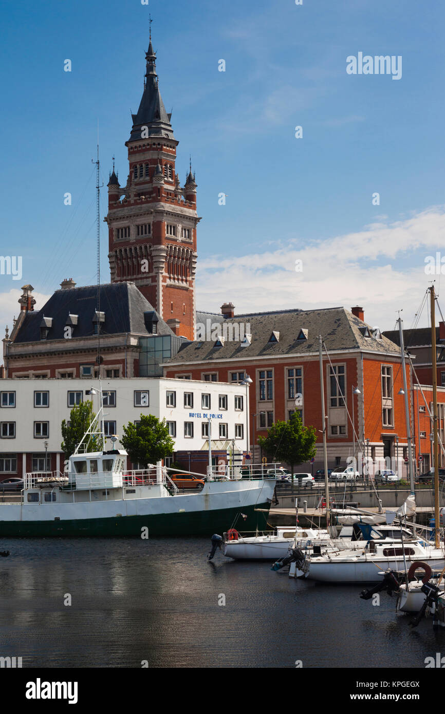 France, Nord, French Flanders, Dunkerque, Bassin du Commerce marina and town hall tower. Stock Photo