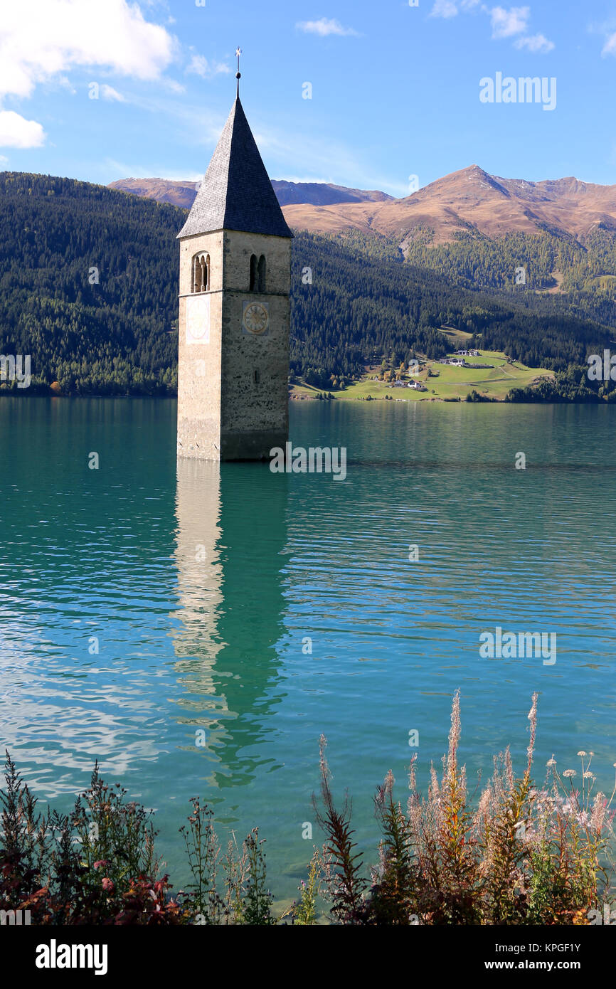 church tower in reschensee in vinschgau Stock Photo