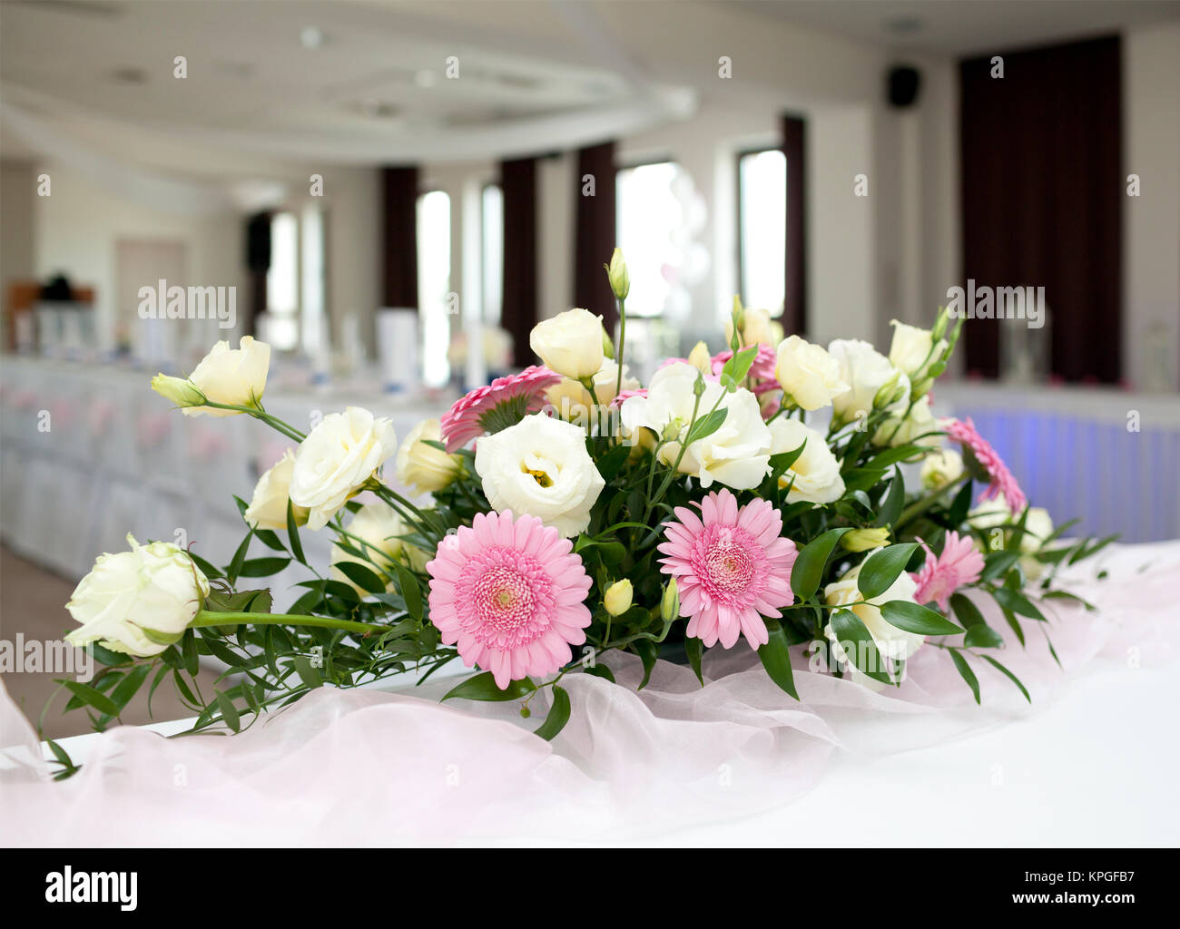 Wedding table with bouquet of gerbera flowers Stock Photo Alamy