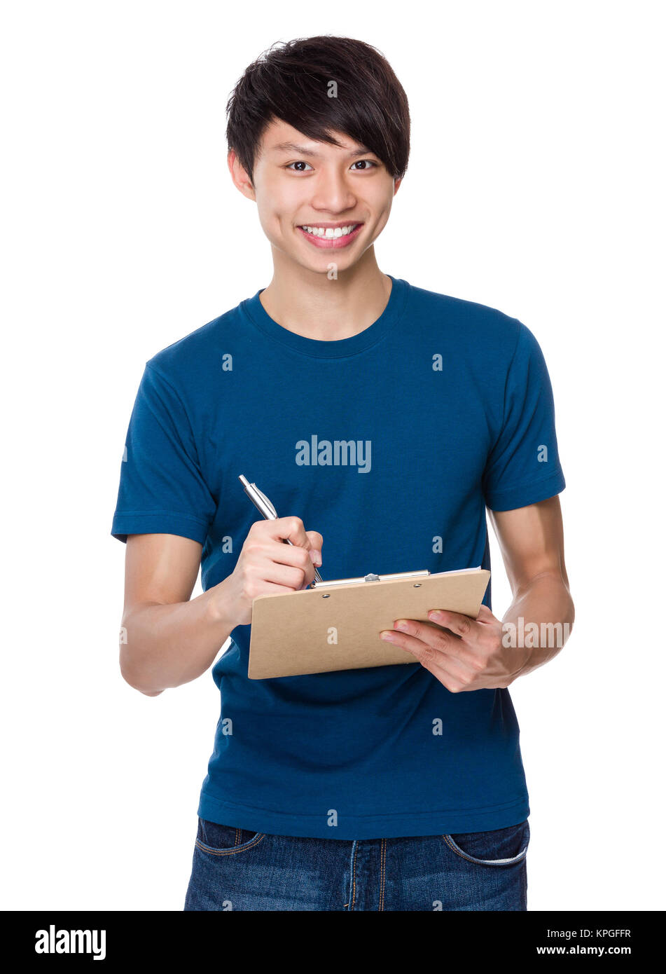 Young man take note on clipboard Stock Photo - Alamy