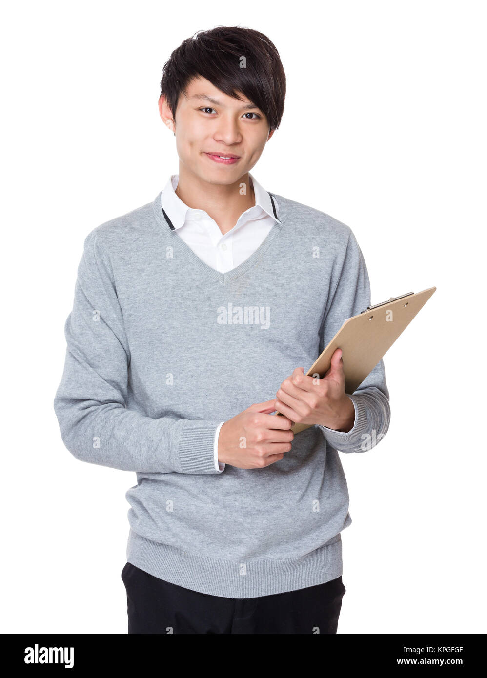 Asian young businessman hold with clipboard Stock Photo - Alamy