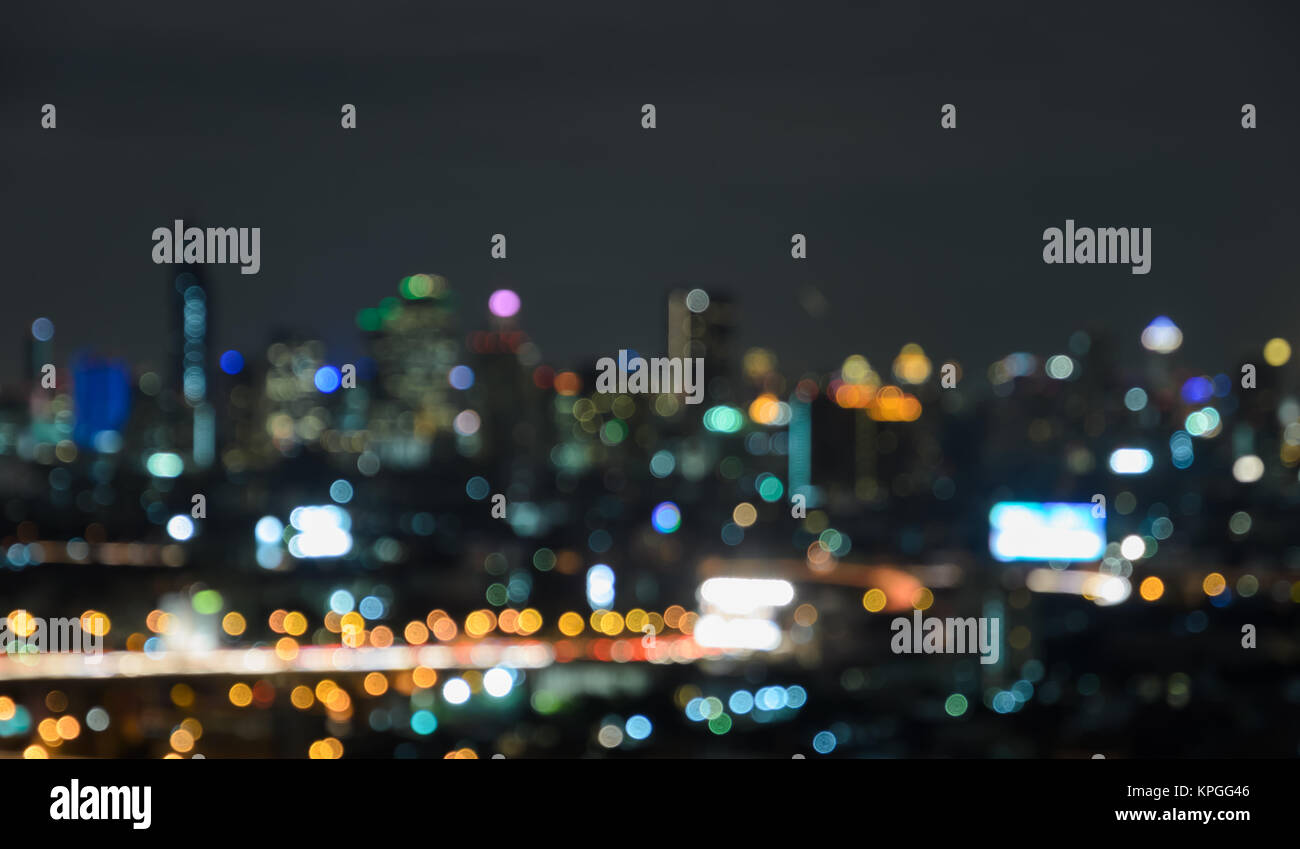 Aerial view of city skyline at twilight. Blur cityscape background ...