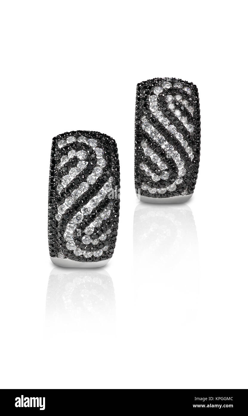 Black and white diamond pave swirl earrings Stock Photo