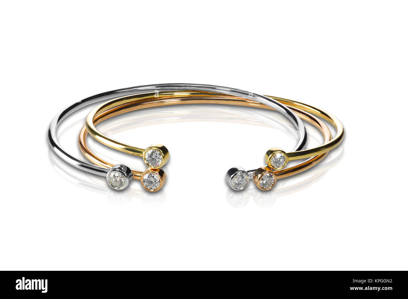 Set of three colored gold and diamond bracelets stacked Stock Photo Alamy