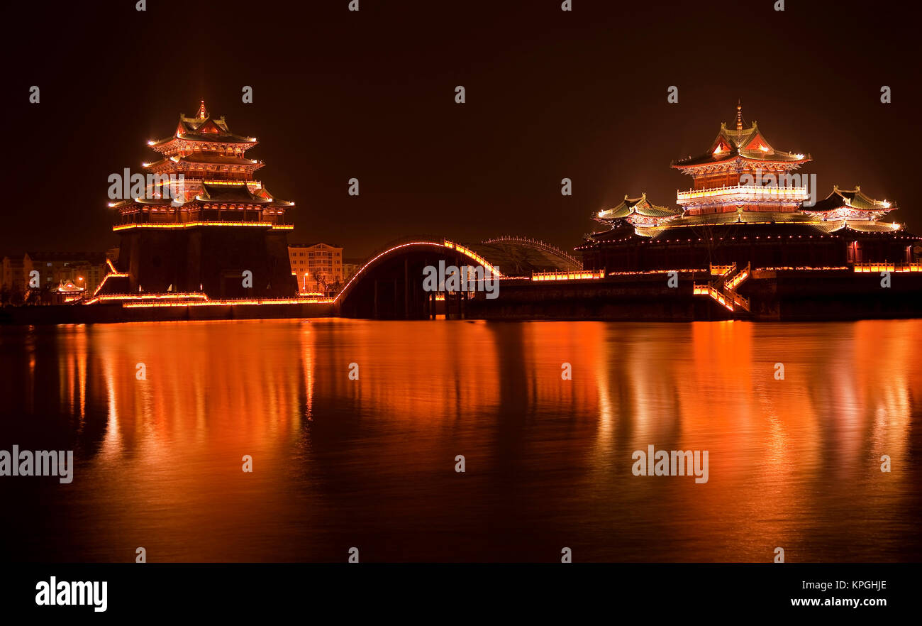 Ancient Temple Night Reflection Bridge Jinming Lake Kaifeng China Kaifeng was the capital of the Song Dynasty, 1000 to 1100AD. Stock Photo