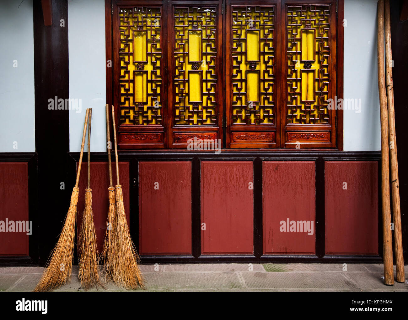 Straw Brooms Windows Wall Baoguang Si Shining Treasure Buddhist Temple, Chengdu, Sichuan, China. Front of Temple Stock Photo